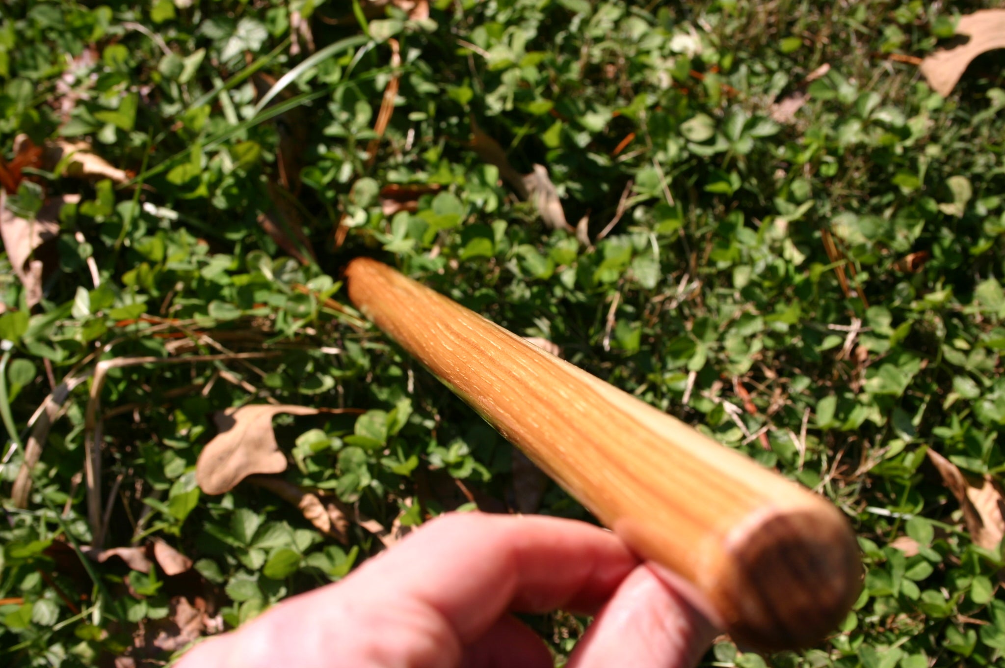 Holding a Handmade Hickory Tanbo