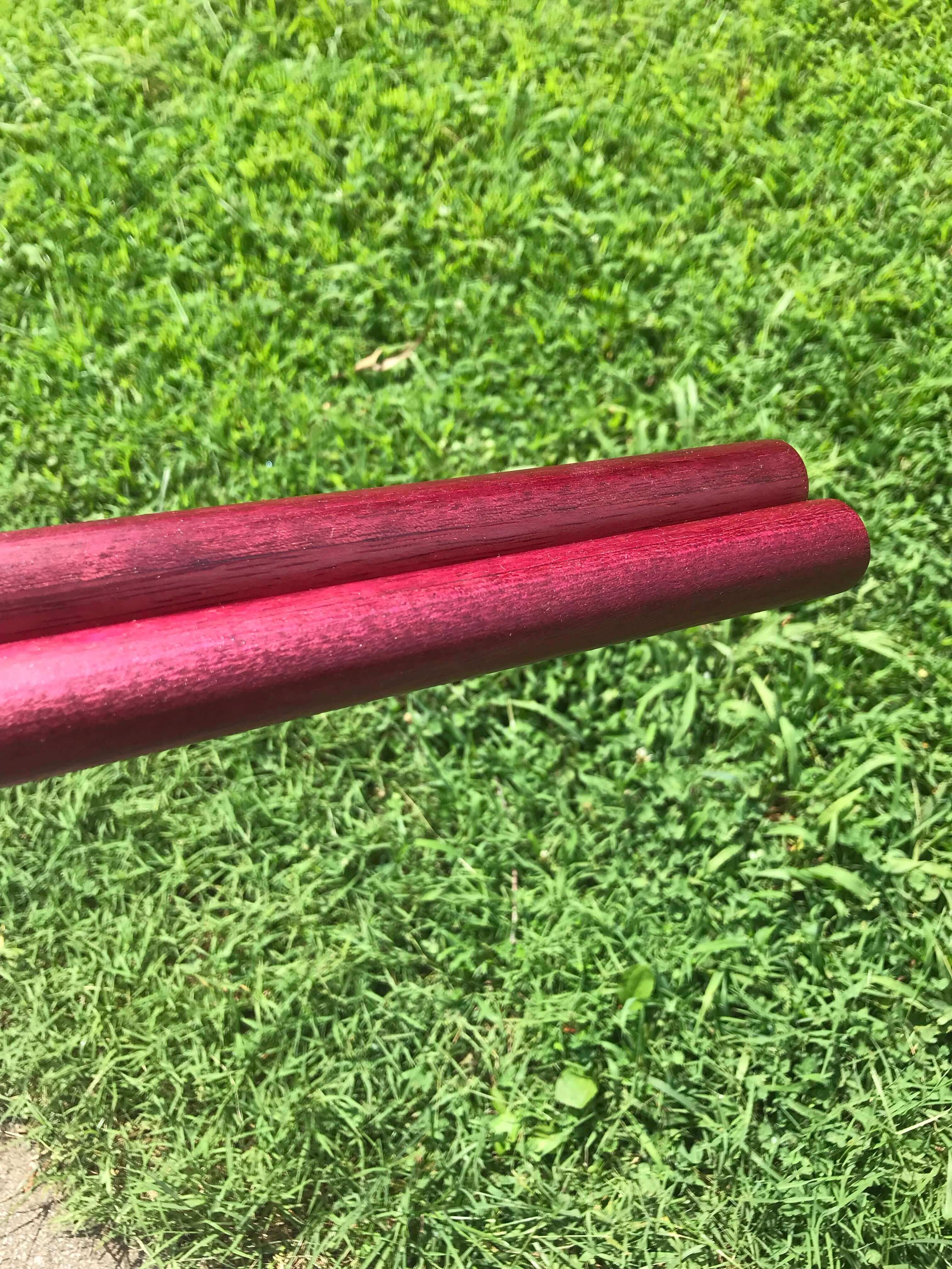 A Pair of Purple Heart Tanbo from Scrapwood Martial Arts.