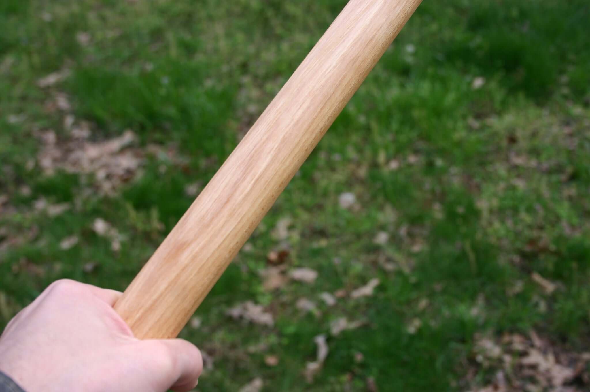 Holding a Hickory Handmade Tanbo Staff